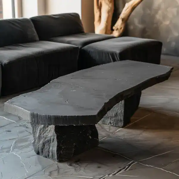 Table en béton ciré noir brut de forme libre